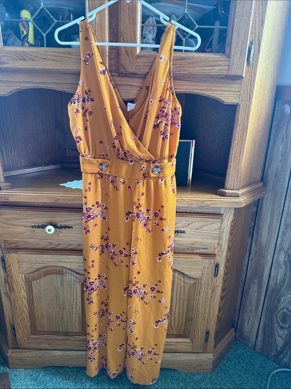 Xhilaration jumpsuit size medium EUC Deeper yellow with floral print